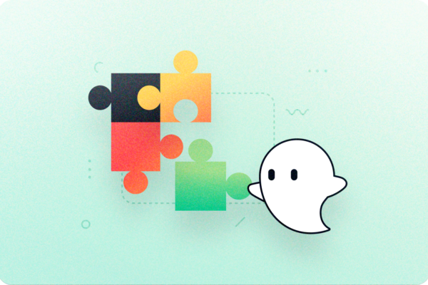 Ghost Inspector mascot ghostie connecting the 4th piece to a puzzle.